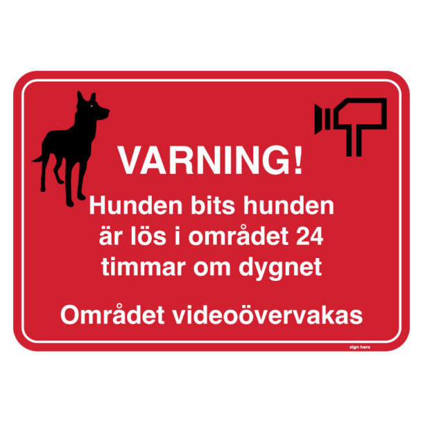 Varning! Hunden bits hunden är lös i området 24 timmar om dygnet - Området videoövervakas skylt